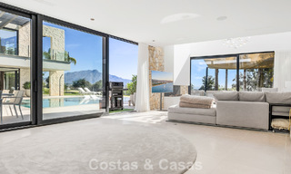 Instapklare, moderne villa te koop, grenzend aan de golfbaan in een begeerde villawijk van Marbella - Benahavis 778672 