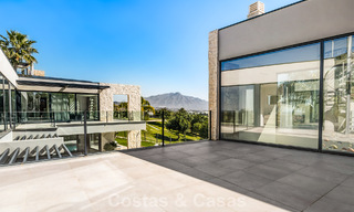 Instapklare, moderne villa te koop, grenzend aan de golfbaan in een begeerde villawijk van Marbella - Benahavis 778692 