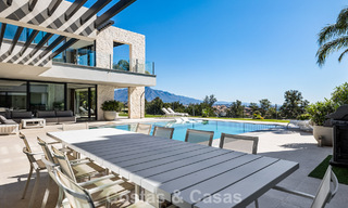 Instapklare, moderne villa te koop, grenzend aan de golfbaan in een begeerde villawijk van Marbella - Benahavis 778713 