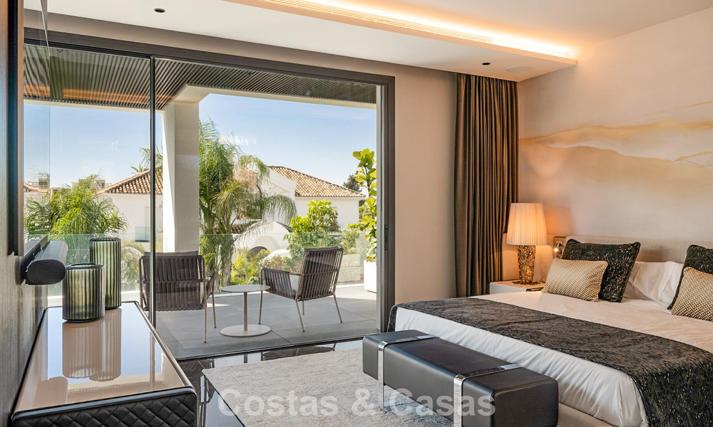 Instapklare, geavanceerde luxevilla te koop op een steenworp van het strand op Marbella’s begeerde Golden Mile 779376