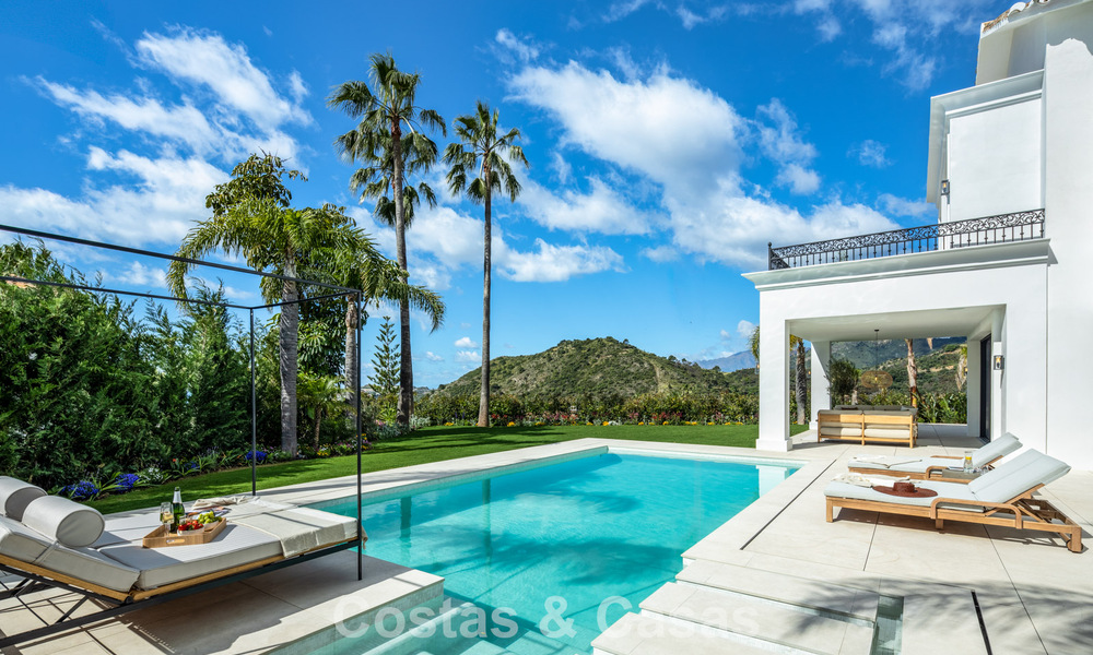 Royale villa met luxueus, mediterrane architectuur te koop, grenzend aan de golfbaan in Marbella - Benahavis 779647