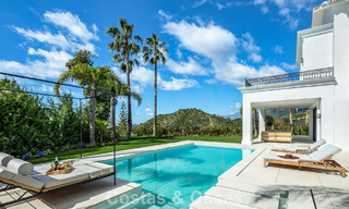 Royale villa met luxueus, mediterrane architectuur te koop, grenzend aan de golfbaan in Marbella - Benahavis 779647 