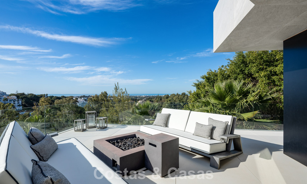 Avant-garde desginervilla met panoramisch zeezicht te koop in een gated community in Benahavis - Marbella 779980