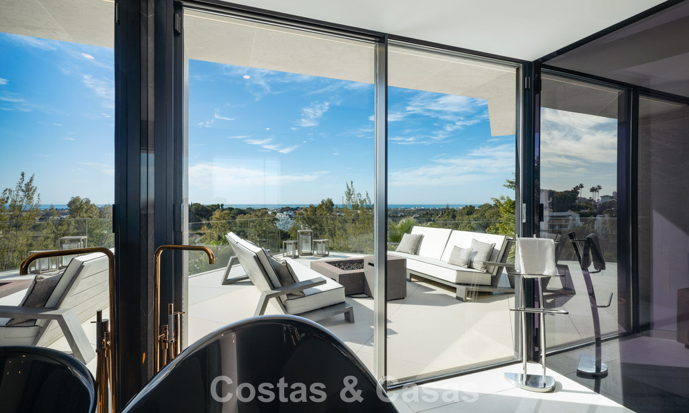 Avant-garde desginervilla met panoramisch zeezicht te koop in een gated community in Benahavis - Marbella 779984