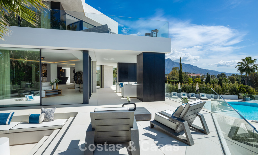 Avant-garde desginervilla met panoramisch zeezicht te koop in een gated community in Benahavis - Marbella 779993