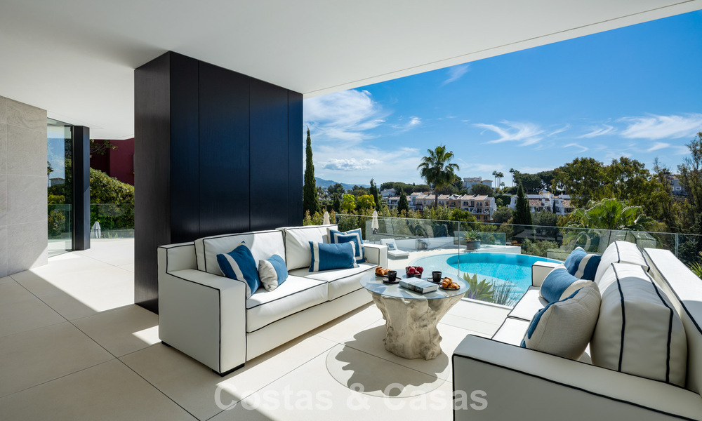 Avant-garde desginervilla met panoramisch zeezicht te koop in een gated community in Benahavis - Marbella 779995
