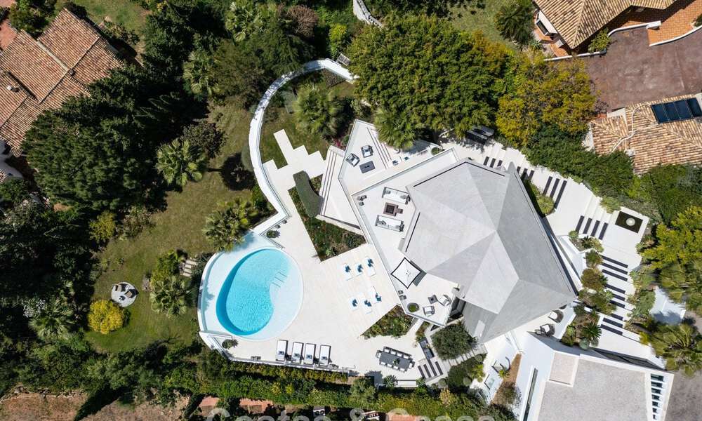 Avant-garde desginervilla met panoramisch zeezicht te koop in een gated community in Benahavis - Marbella 780009