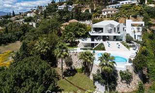 Avant-garde desginervilla met panoramisch zeezicht te koop in een gated community in Benahavis - Marbella 780010 