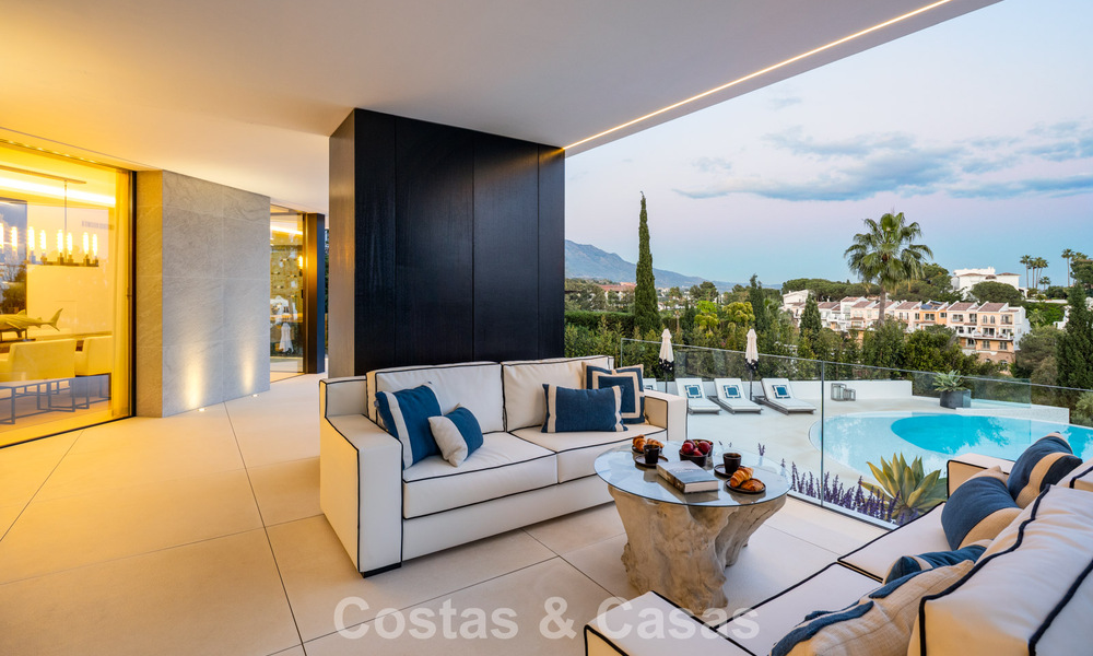 Avant-garde desginervilla met panoramisch zeezicht te koop in een gated community in Benahavis - Marbella 780015