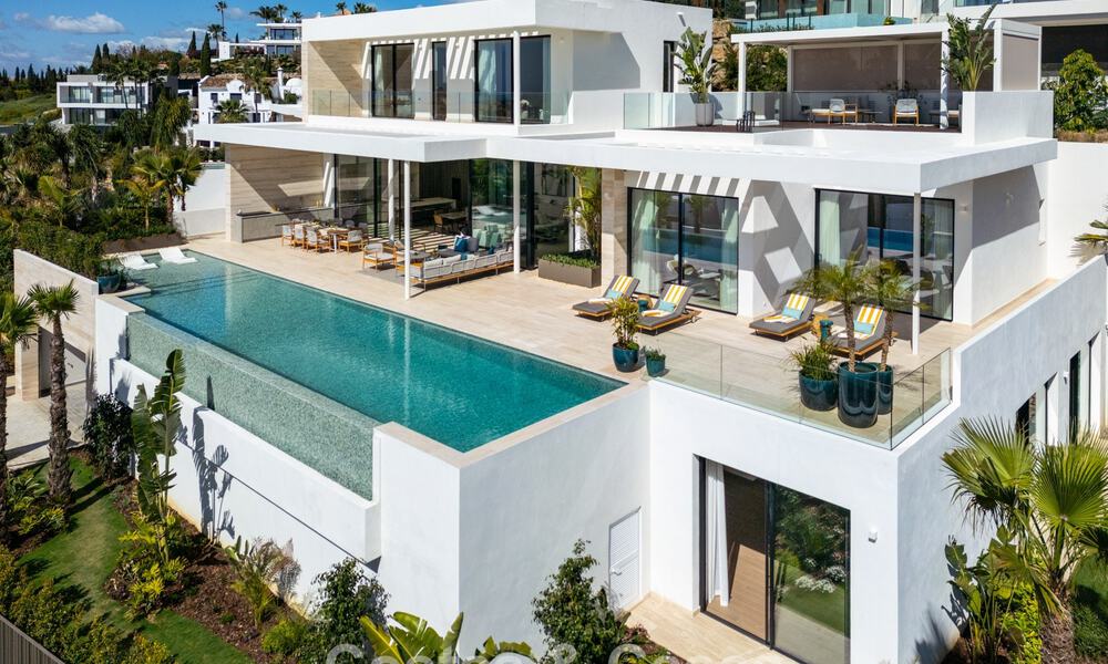 High-end luxevilla met panoramische vergezichten te koop in een golfresort op de Golden Mile in Benahavis - Marbella 780117