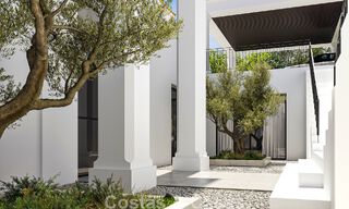 Exclusieve luxevilla met een klasssieke, eigentijdse-Andalusische architectuur te koop in een beveiligde gemeenschap in Benahavis - Marbella 780389 