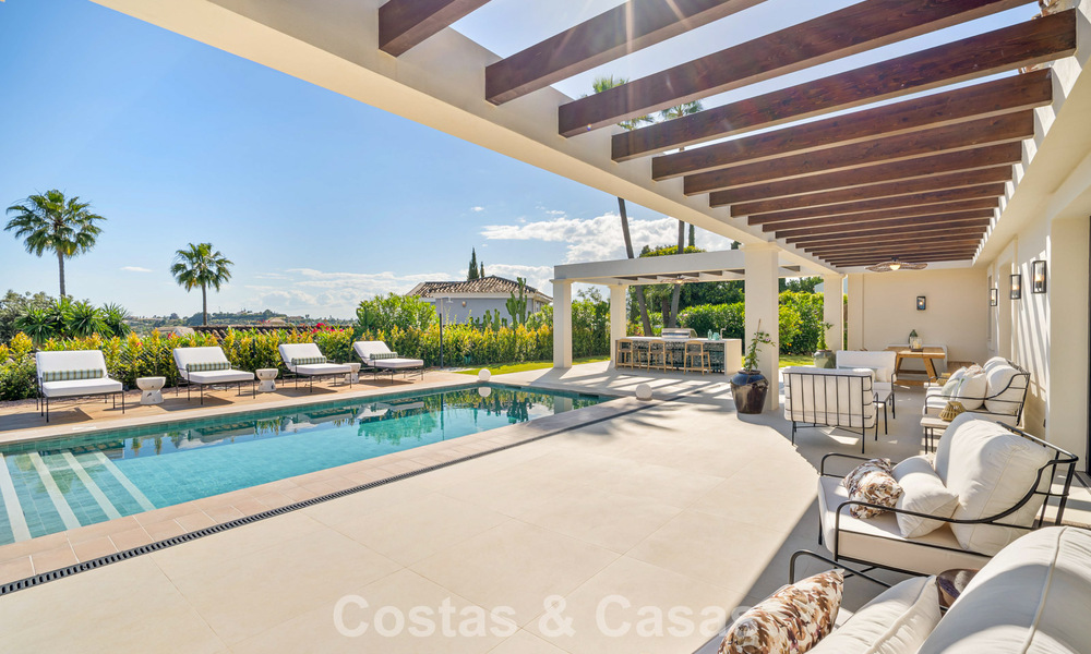 Instapklare, gelijkvloerse luxevilla te koop in Nueva Andalucia’s golfvallei, Marbella 780946