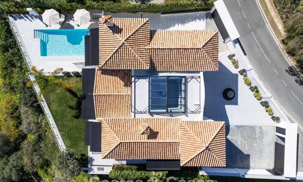 Instapklare luxevilla met eigentijdse, Spaanse architectuur en zeezicht te koop in Marbella - Benahavis 781370