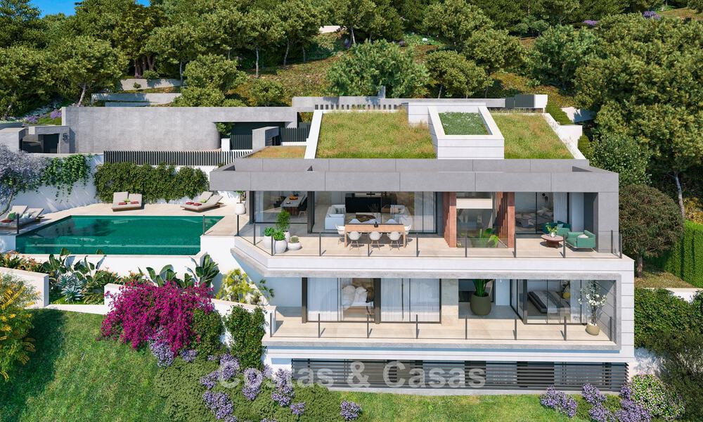 Designgerichte nieuwbouwvilla met zeezicht te koop in een gated villawijk ten oosten van Malaga centrum 782571