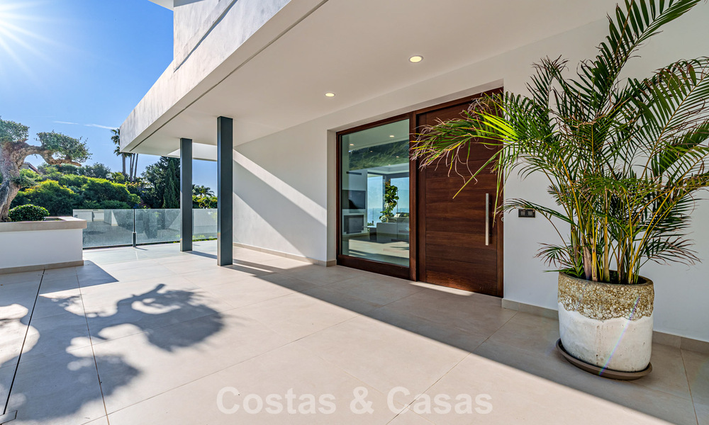 Instapklare, moderne luxevilla met panoramisch zeezicht te koop in een rustige woonwijk in Benalmadena, Costa del Sol 782320