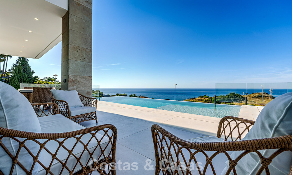 Instapklare, moderne luxevilla met panoramisch zeezicht te koop in een rustige woonwijk in Benalmadena, Costa del Sol 782334