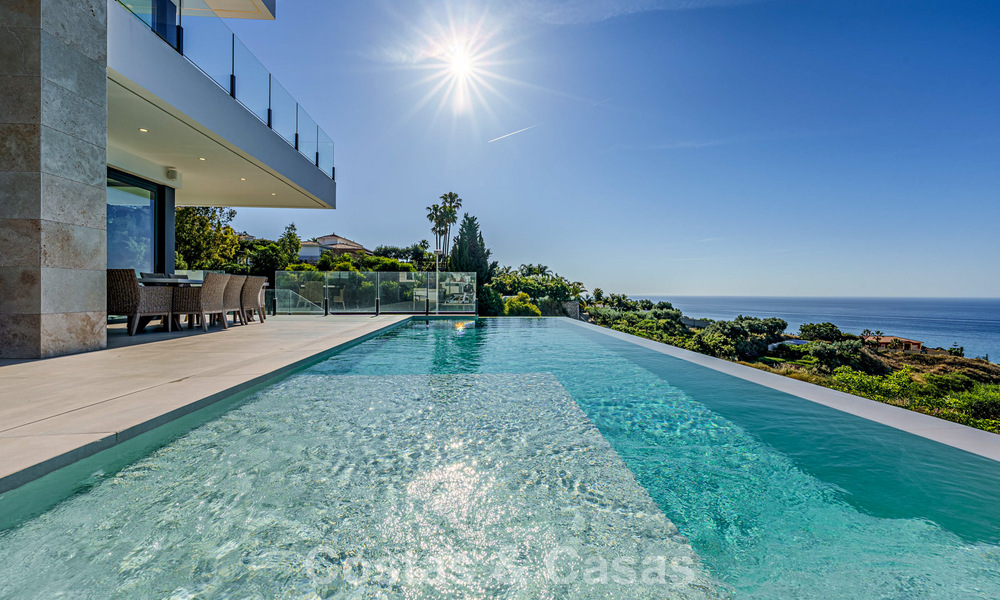 Instapklare, moderne luxevilla met panoramisch zeezicht te koop in een rustige woonwijk in Benalmadena, Costa del Sol 782355