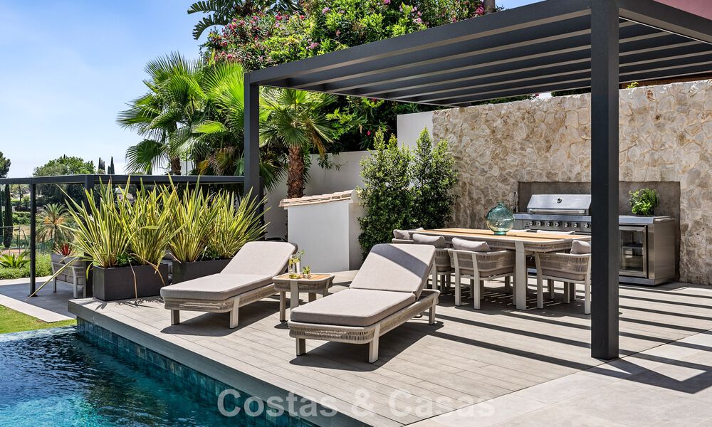 Eerstelijnsgolf villa met golf- en zeezicht te koop in het prestigieus 5* Golfresort in Marbella - Benahavis 783386