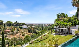 Eerstelijnsgolf villa met golf- en zeezicht te koop in het prestigieus 5* Golfresort in Marbella - Benahavis 783390 