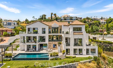 Eerstelijnsgolf villa met golf- en zeezicht te koop in het prestigieus 5* Golfresort in Marbella - Benahavis 783395