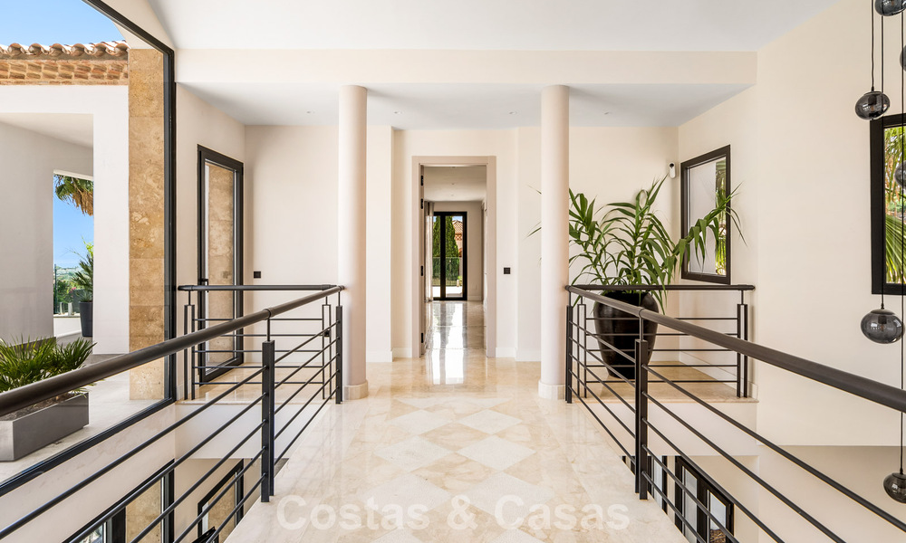 Eerstelijnsgolf villa met golf- en zeezicht te koop in het prestigieus 5* Golfresort in Marbella - Benahavis 783396