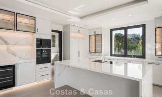 Instapklare, hedendaagse luxevilla te koop grenzend aan de golfbaan op de New Golden Mile tussen Marbella en Estepona 783286 