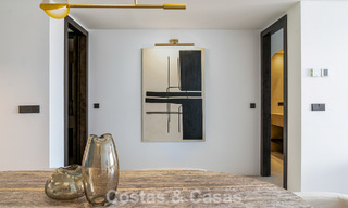 Modern gerenoveerd appartement met prachtig zeezicht te koop op een steenworp van het strand op Marbella’s Golden Mile 783804 