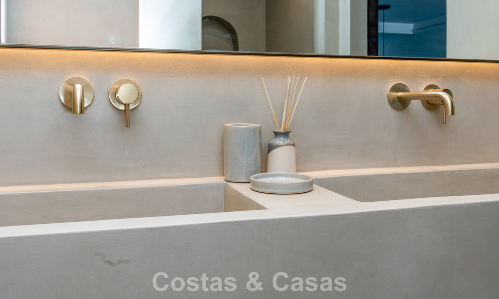 Modern gerenoveerd appartement met prachtig zeezicht te koop op een steenworp van het strand op Marbella’s Golden Mile 783828