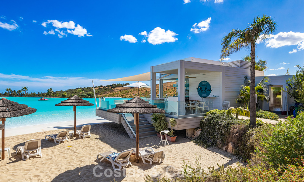 Instapklaar, 2-slaapkamer tuinappartement te koop in een exclusief complex nabij een grote blauwe lagune aan de Costa del Sol 783969