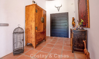 Instapklare, gelijkvloerse luxevilla te koop eerstelijns golf in een toonaangevend resort in Mijas, Costa del Sol 783923 