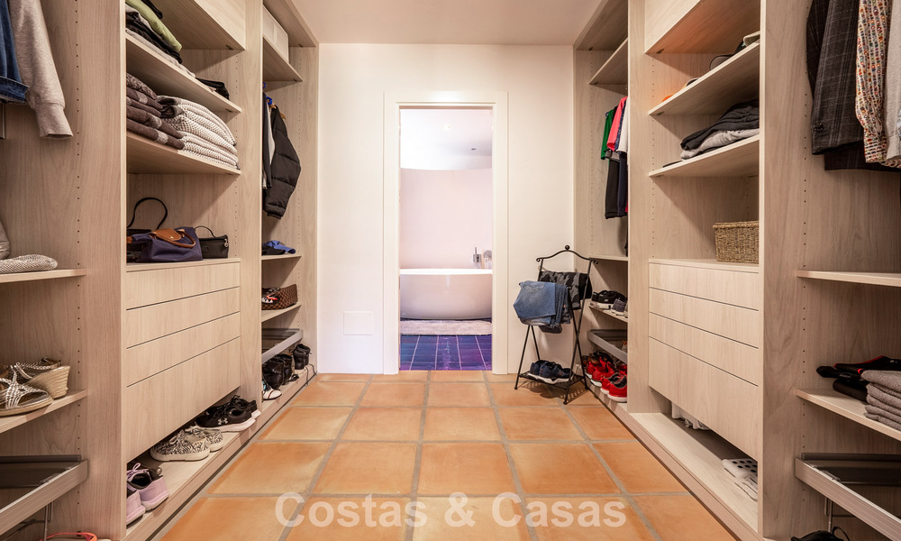 Instapklare, gelijkvloerse luxevilla te koop eerstelijns golf in een toonaangevend resort in Mijas, Costa del Sol 783928