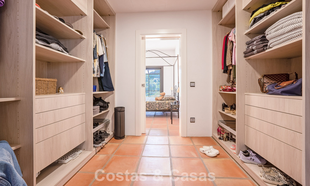 Instapklare, gelijkvloerse luxevilla te koop eerstelijns golf in een toonaangevend resort in Mijas, Costa del Sol 783933