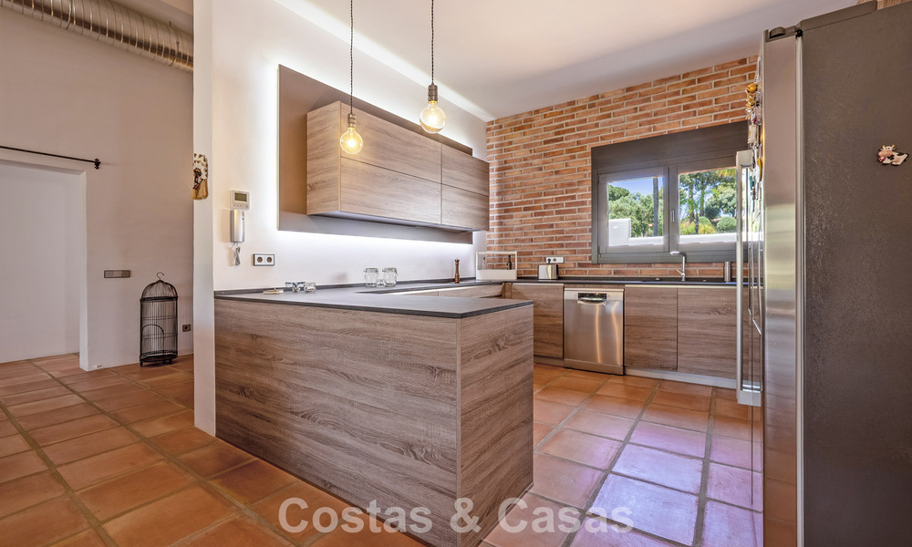 Instapklare, gelijkvloerse luxevilla te koop eerstelijns golf in een toonaangevend resort in Mijas, Costa del Sol 783938