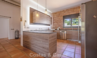 Instapklare, gelijkvloerse luxevilla te koop eerstelijns golf in een toonaangevend resort in Mijas, Costa del Sol 783938 