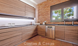 Instapklare, gelijkvloerse luxevilla te koop eerstelijns golf in een toonaangevend resort in Mijas, Costa del Sol 783939 