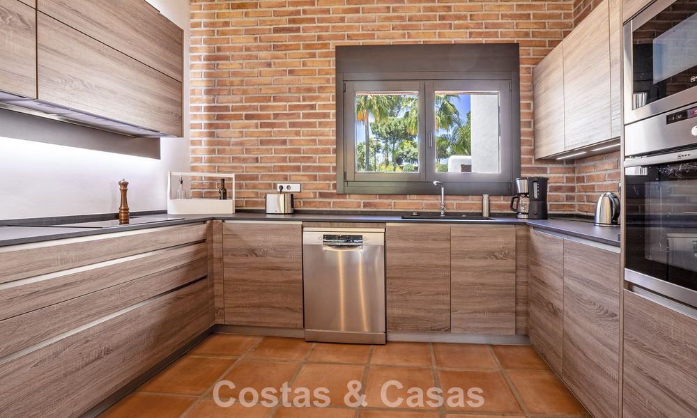 Instapklare, gelijkvloerse luxevilla te koop eerstelijns golf in een toonaangevend resort in Mijas, Costa del Sol 783940