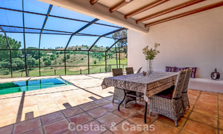 Instapklare, gelijkvloerse luxevilla te koop eerstelijns golf in een toonaangevend resort in Mijas, Costa del Sol 783953 