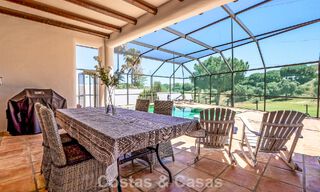 Instapklare, gelijkvloerse luxevilla te koop eerstelijns golf in een toonaangevend resort in Mijas, Costa del Sol 783954 