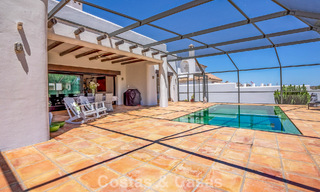 Instapklare, gelijkvloerse luxevilla te koop eerstelijns golf in een toonaangevend resort in Mijas, Costa del Sol 783955 