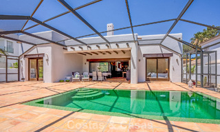 Instapklare, gelijkvloerse luxevilla te koop eerstelijns golf in een toonaangevend resort in Mijas, Costa del Sol 783958 