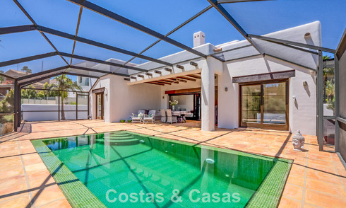 Instapklare, gelijkvloerse luxevilla te koop eerstelijns golf in een toonaangevend resort in Mijas, Costa del Sol 783959