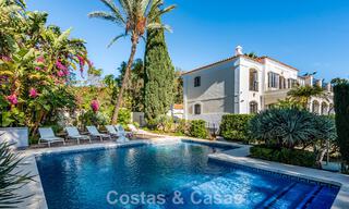 Uitmuntende luxevilla te koop in een tijdloze Andalusische architectuur, met zeezicht in Benahavis - Marbella 786051 