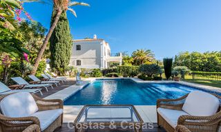 Uitmuntende luxevilla te koop in een tijdloze Andalusische architectuur, met zeezicht in Benahavis - Marbella 786052 