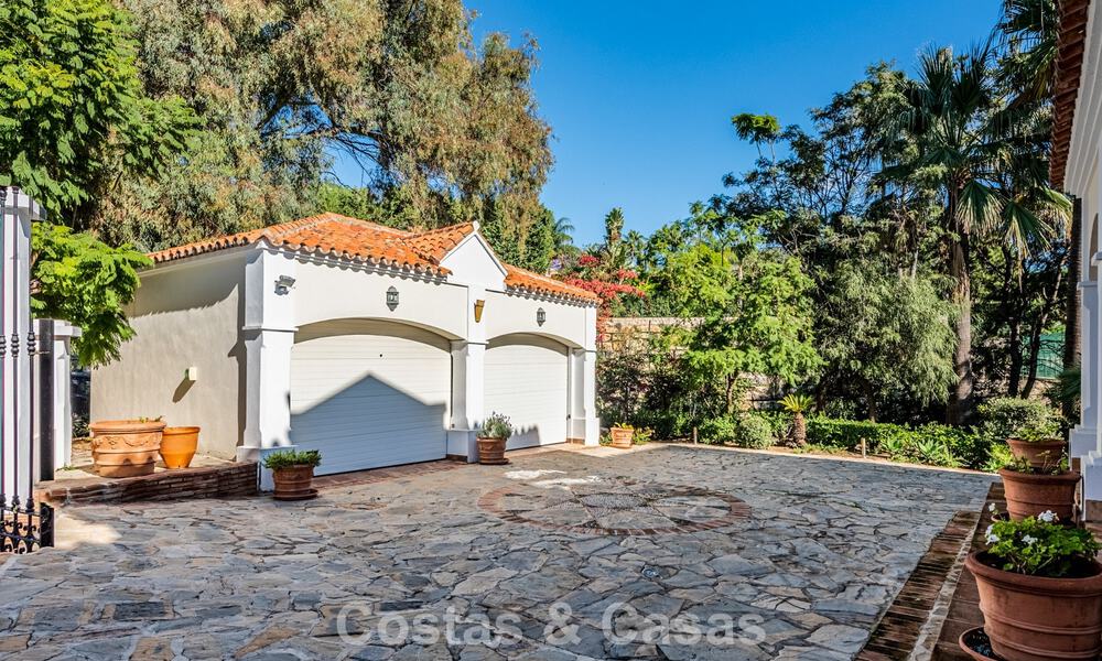 Uitmuntende luxevilla te koop in een tijdloze Andalusische architectuur, met zeezicht in Benahavis - Marbella 786055