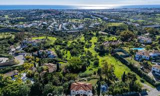 Uitmuntende luxevilla te koop in een tijdloze Andalusische architectuur, met zeezicht in Benahavis - Marbella 786059 