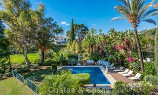 Uitmuntende luxevilla te koop in een tijdloze Andalusische architectuur, met zeezicht in Benahavis - Marbella 786066 