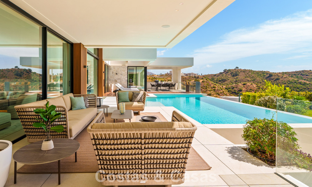 Gesofisticeerde villa met panoramisch uitzicht te koop, in een gated community in La Quinta, Marbella - Benahavis 787340