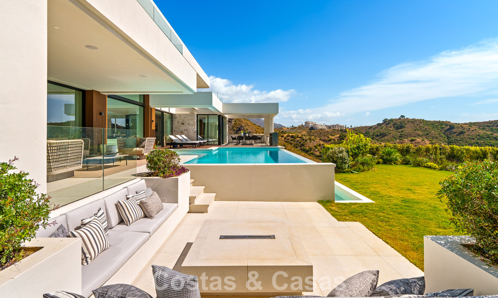 Gesofisticeerde villa met panoramisch uitzicht te koop, in een gated community in La Quinta, Marbella - Benahavis 787341