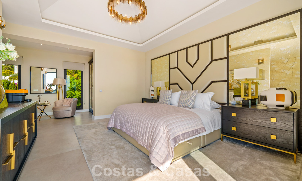 Exclusieve villa met zeezicht te koop, in een beveiligde urbanisatie in La Quinta, Marbella - Benahavis 788574
