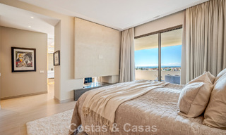 Minimalistische luxewoning met panoramisch zeezicht te koop in een prestigieus gated complex in Nueva Andalucia, Marbella 788618 